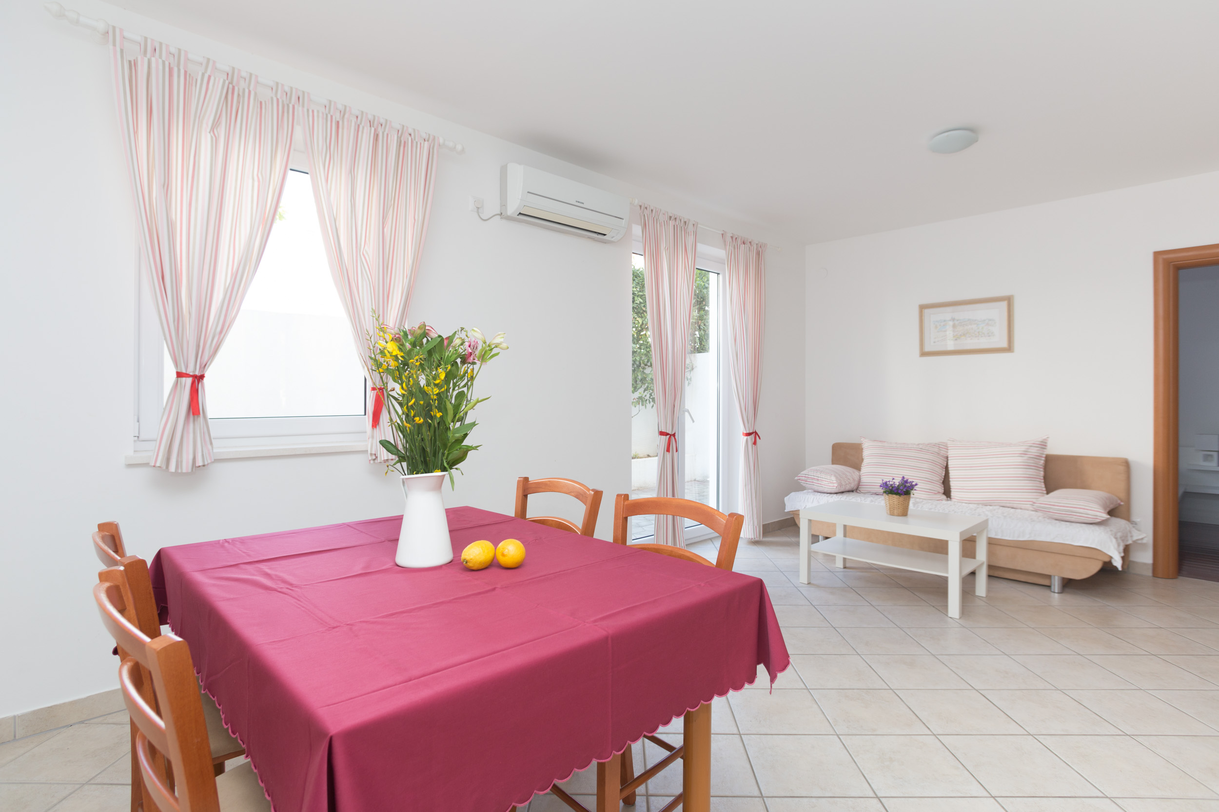 Living room with dining table and sofa