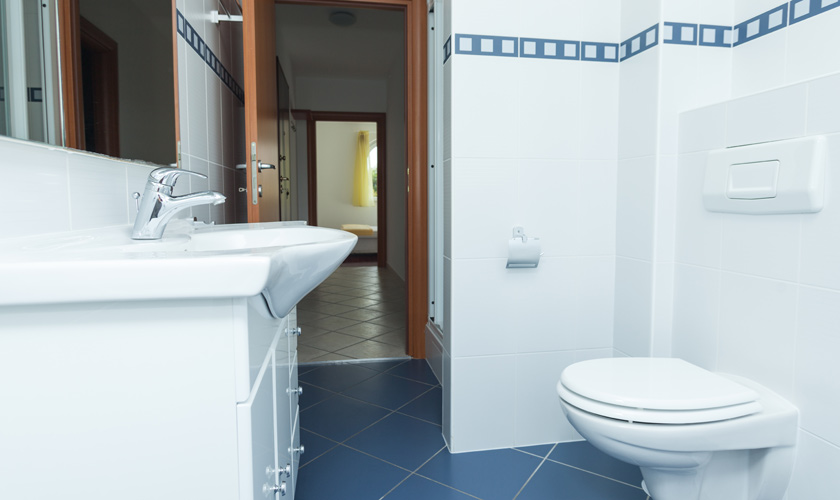 Bathroom with sink and toilet