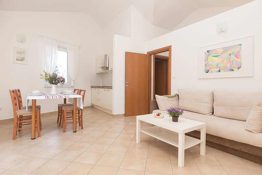 Living room with dining table, sofa and coffee table